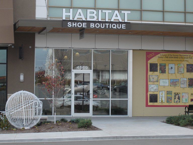 The outside of a shoe boutique called habitat