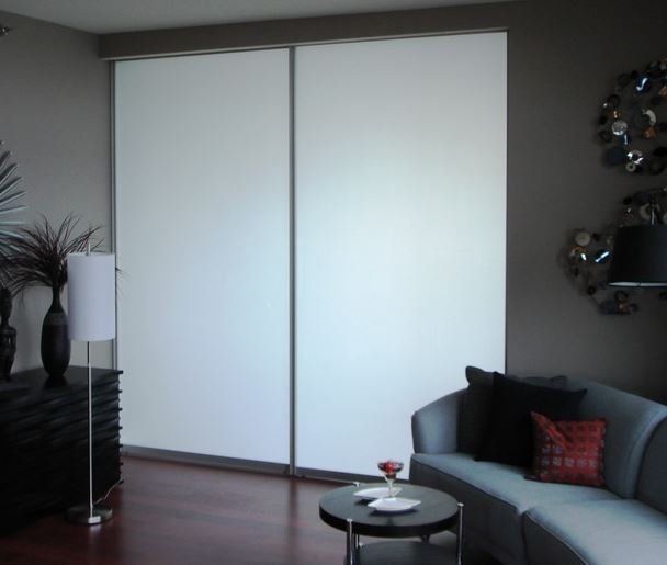 A living room with a couch and a table