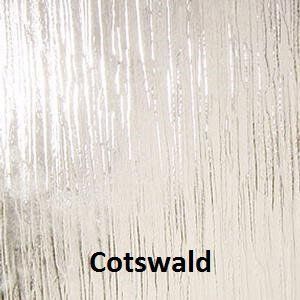 A close up of a glass door with the word cotswold on it.