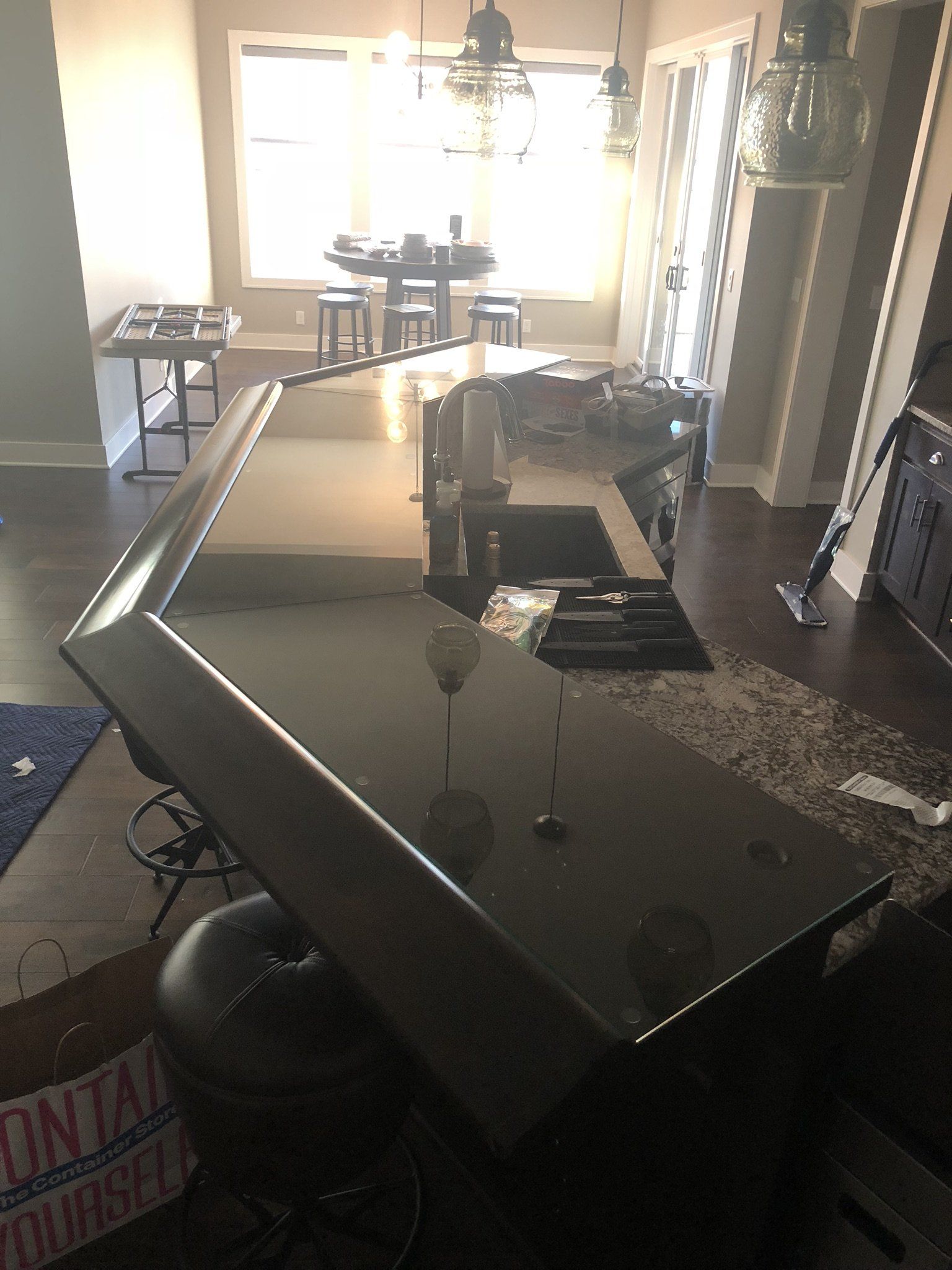 A kitchen with a large counter top and a sink.