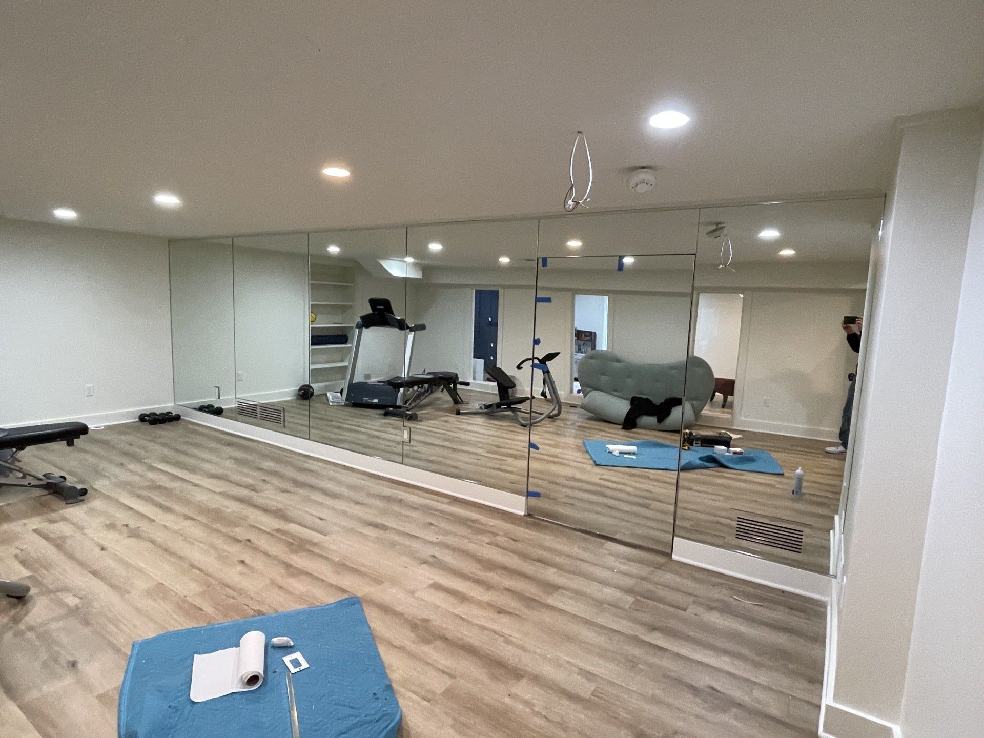 There is a large mirror in the middle of the room.