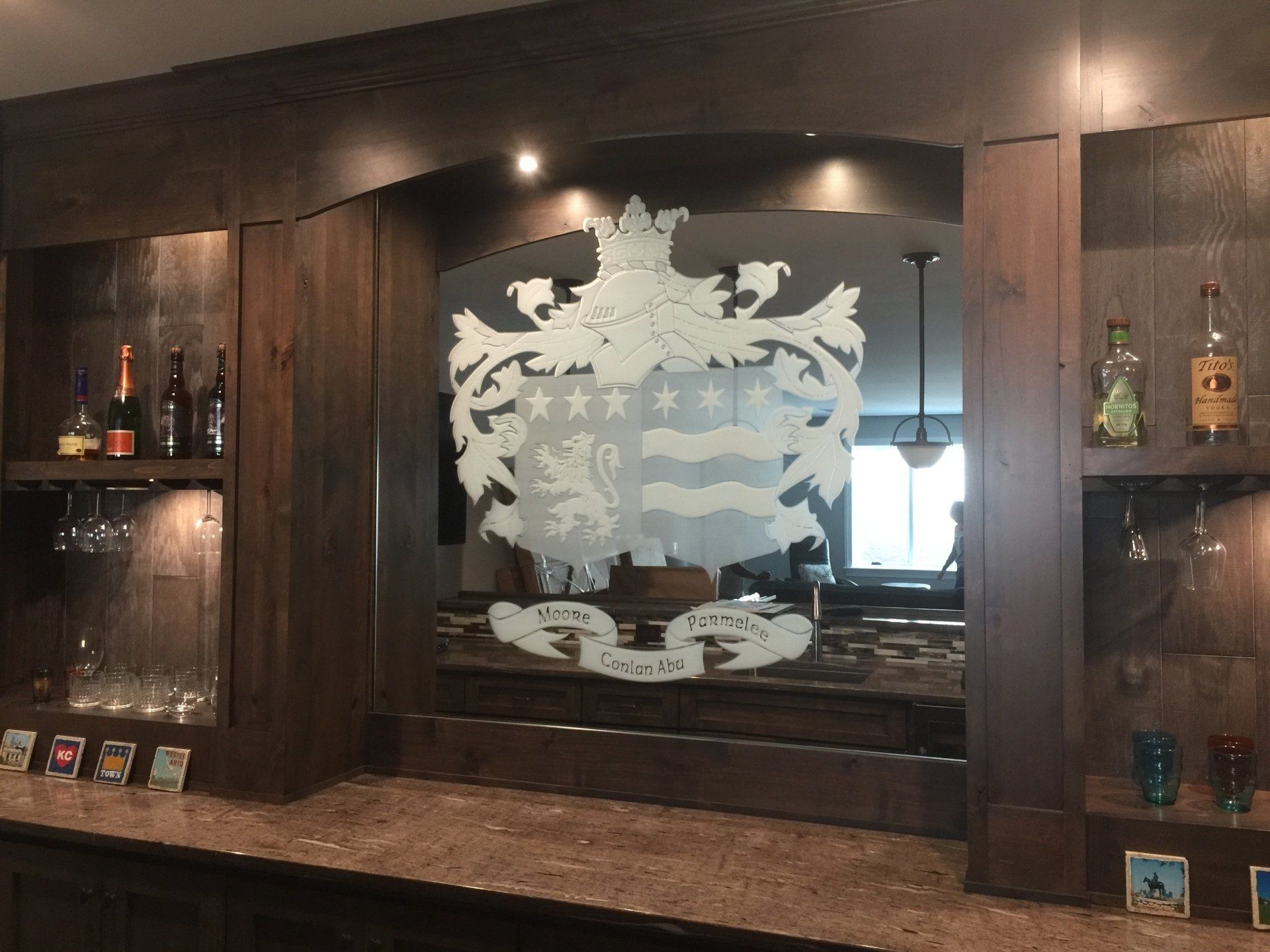 A bar with a coat of arms on the wall