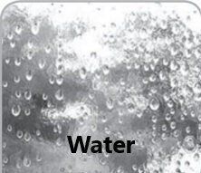 A black and white photo of water bubbles in a glass.