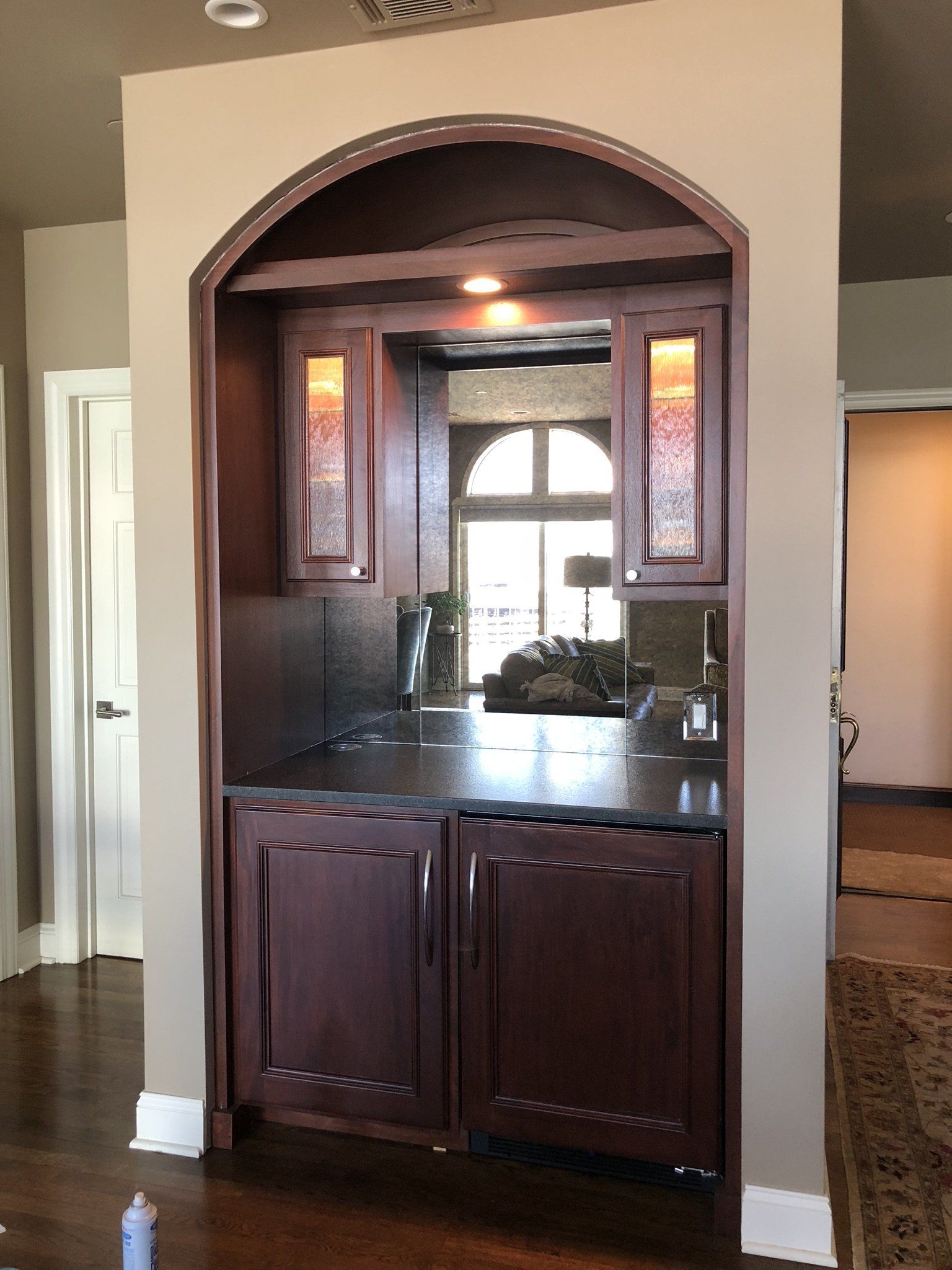 A kitchen with wooden cabinets and a counter top
