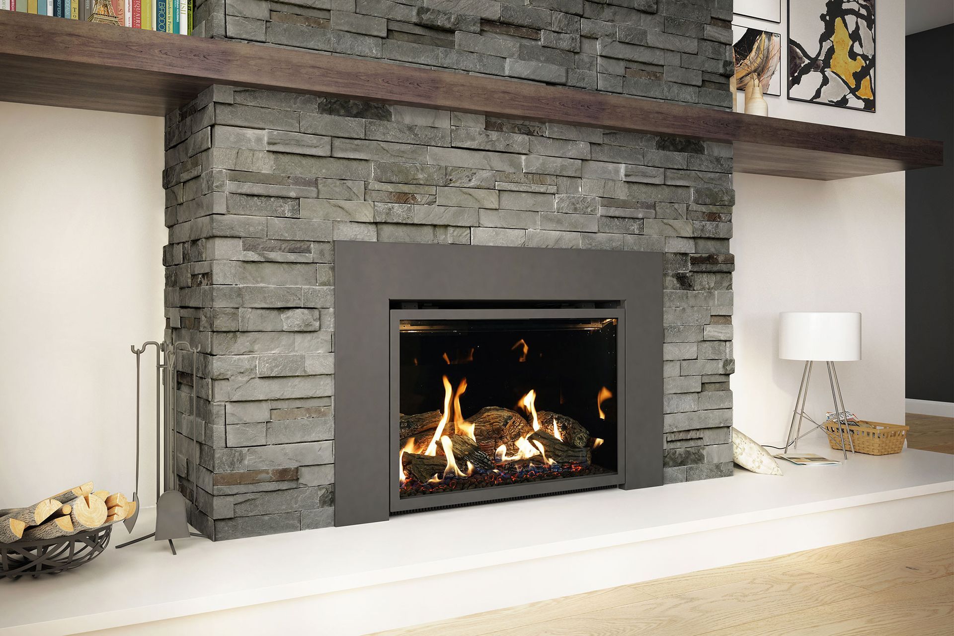 Modern fireplace with a stone facade, black trim, and a burning fire. A shelf with books and art adorns the top.