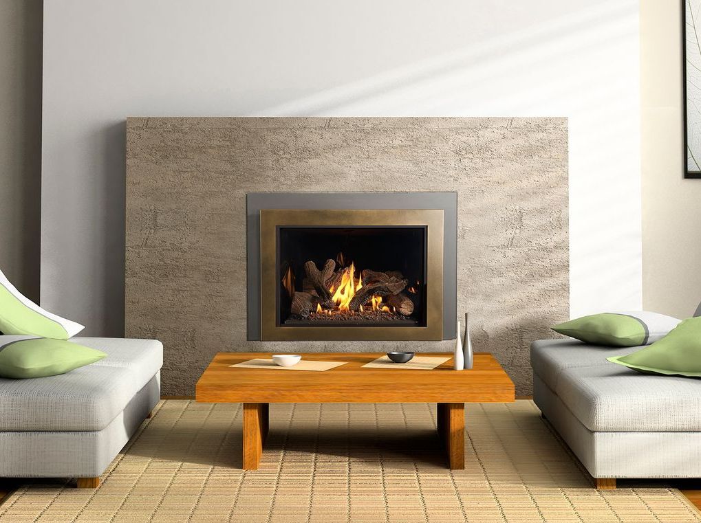 Living room with a lit fireplace, two gray sofas, a wooden coffee table, and beige textured wall.