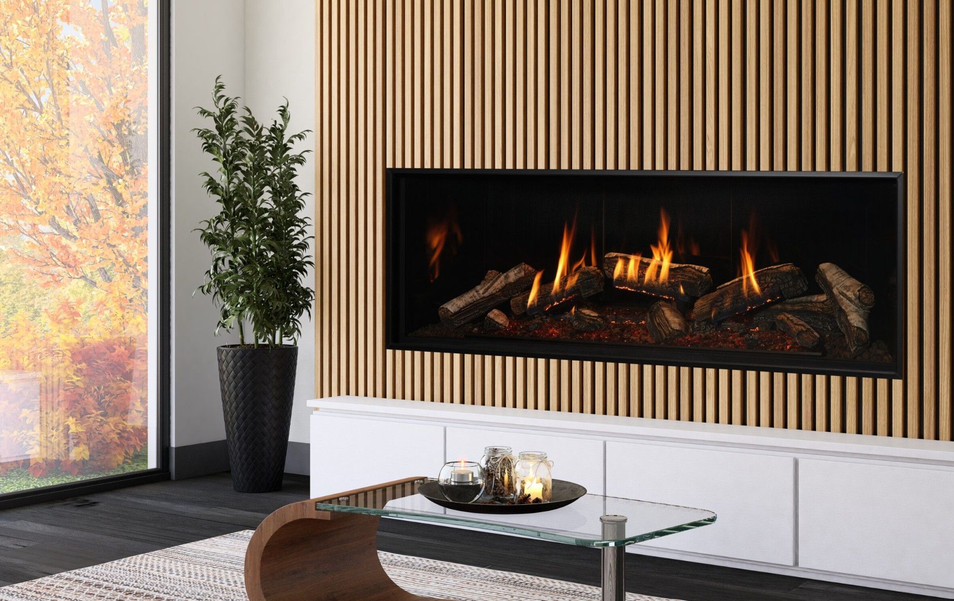 Living room with a fireplace, a bull head decoration above it, and dark gray stonework. A bookshelf and coffee table are also visible.