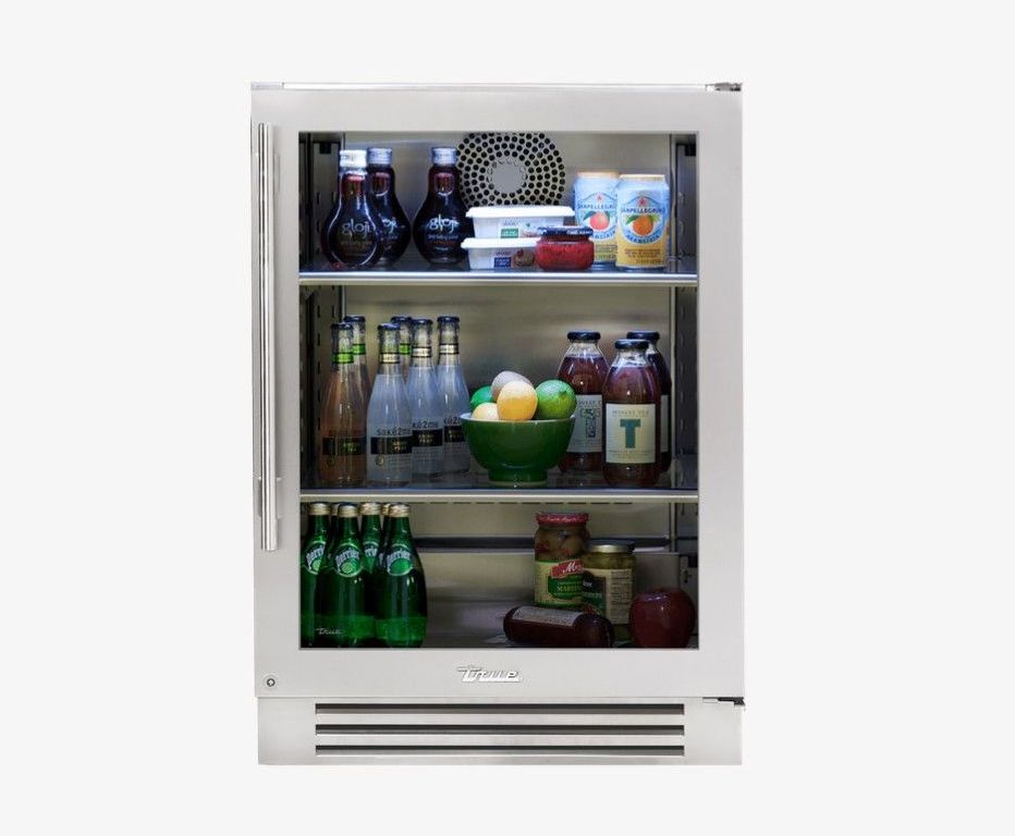 Blue built-in refrigerator with a stainless steel handle and a black bottom panel.
