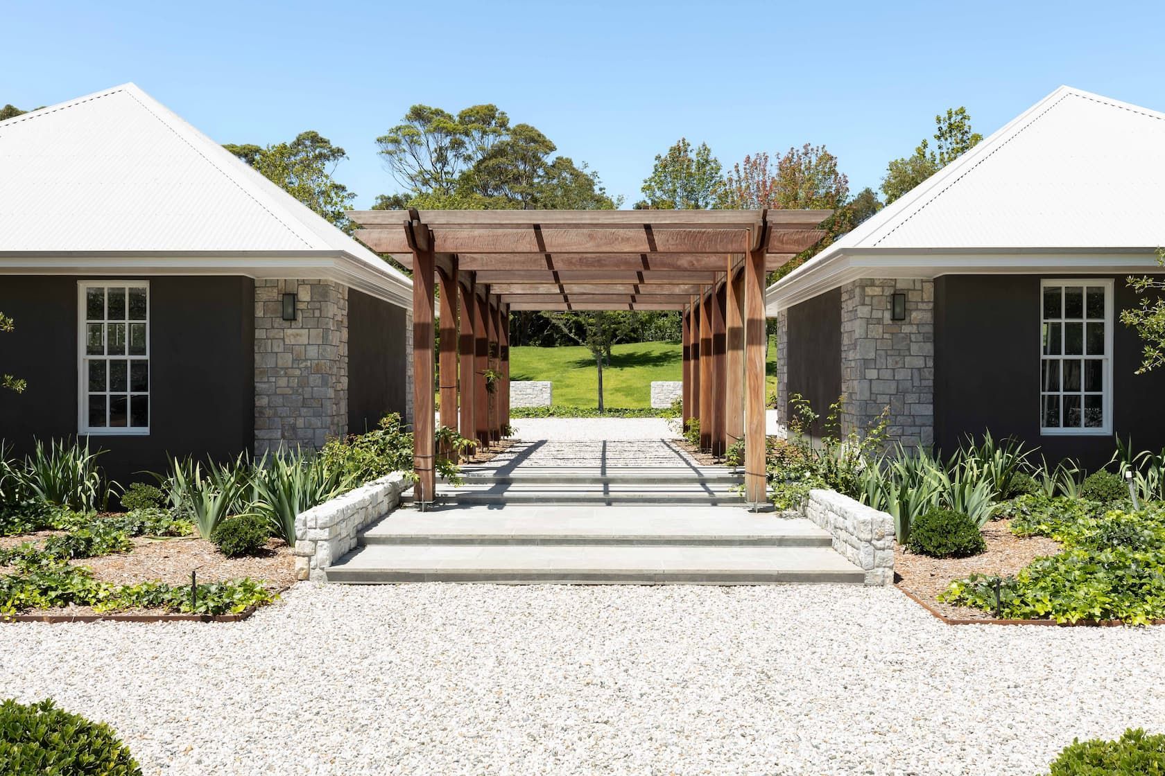 Two Modern Houses With Wooden Structure Between Them — Ridgeline Building Co In Gerringong, NSW