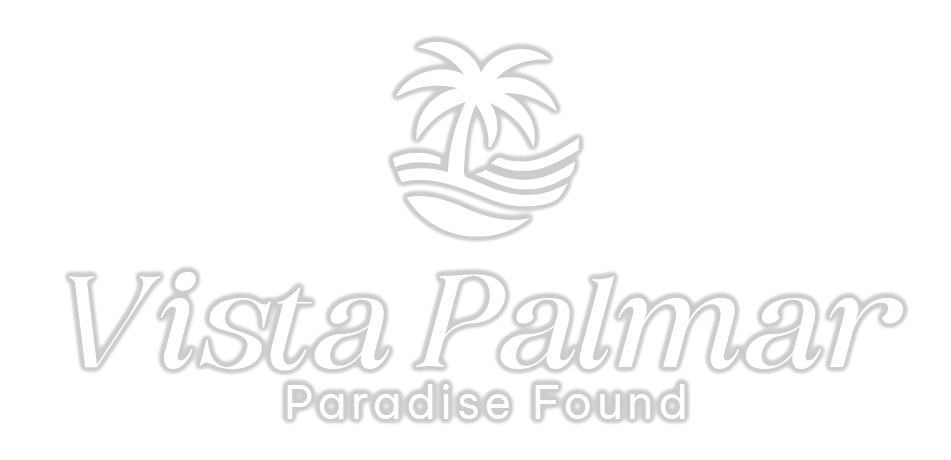 A white logo for vista palmar paradise found with a palm tree.