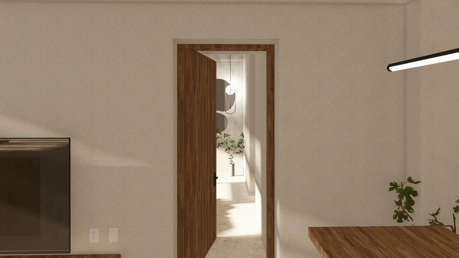 A living room with a wooden table and a wooden door leading to a bathroom.