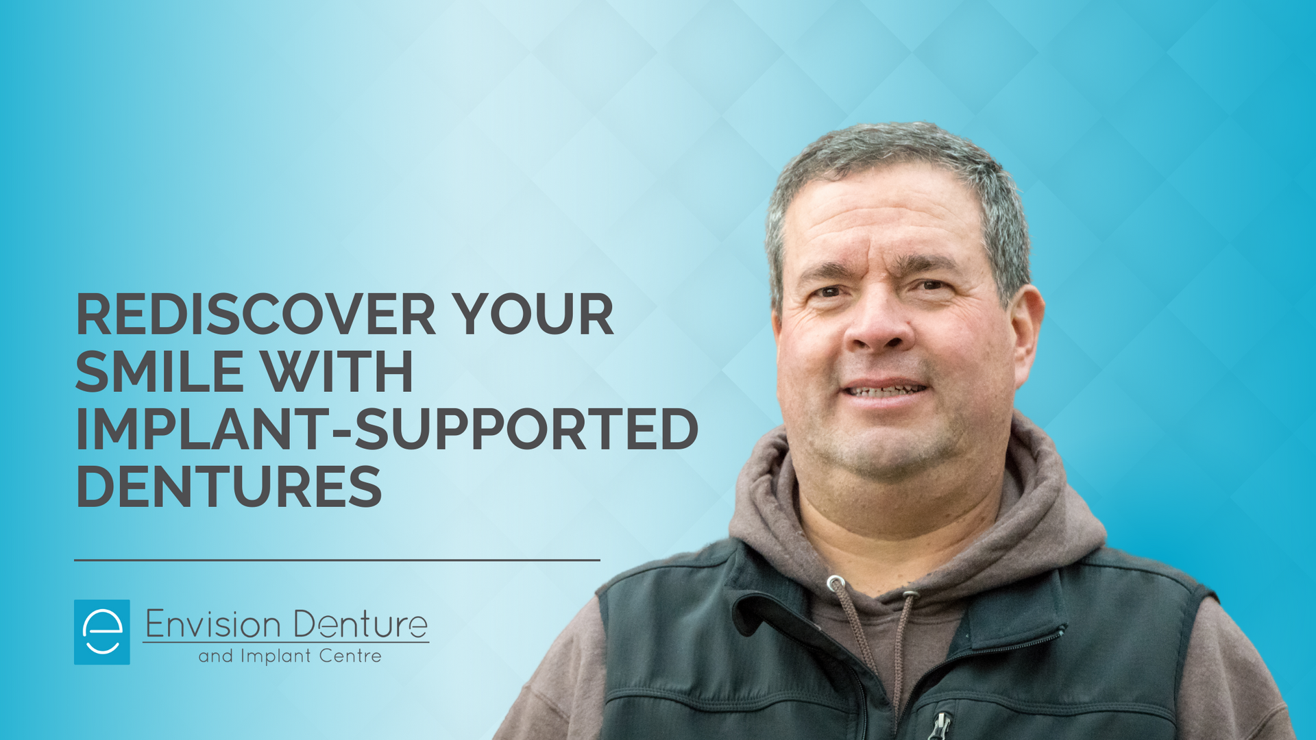 A man is smiling with implant-supported dentures on a blue background.