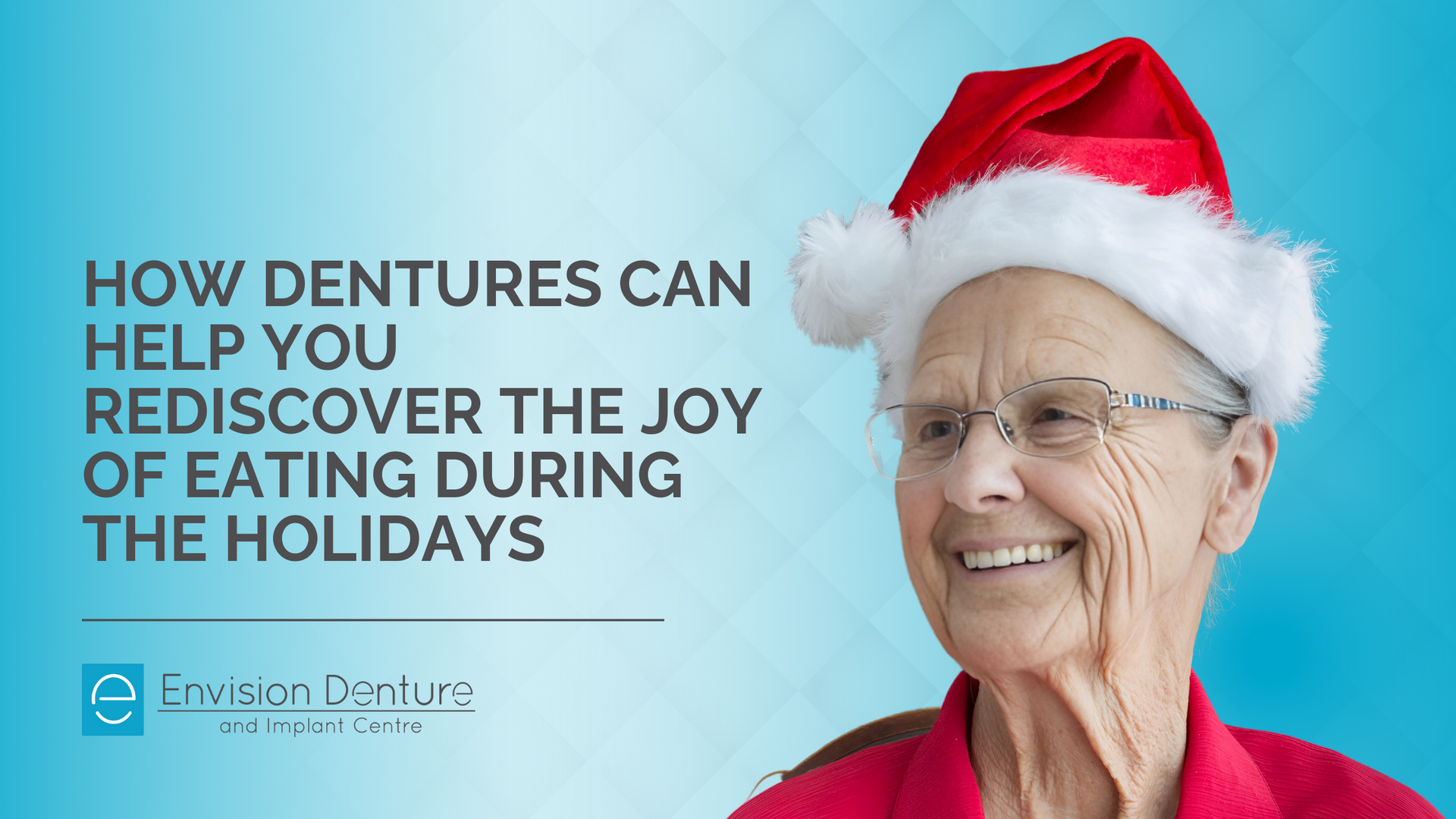 An elderly woman wearing a santa hat and glasses is smiling.