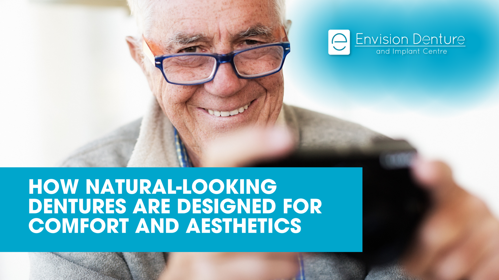 A smiling person looks at a mobile phone, with a text overlay about natural-looking, comfortable, aesthetic dentures.