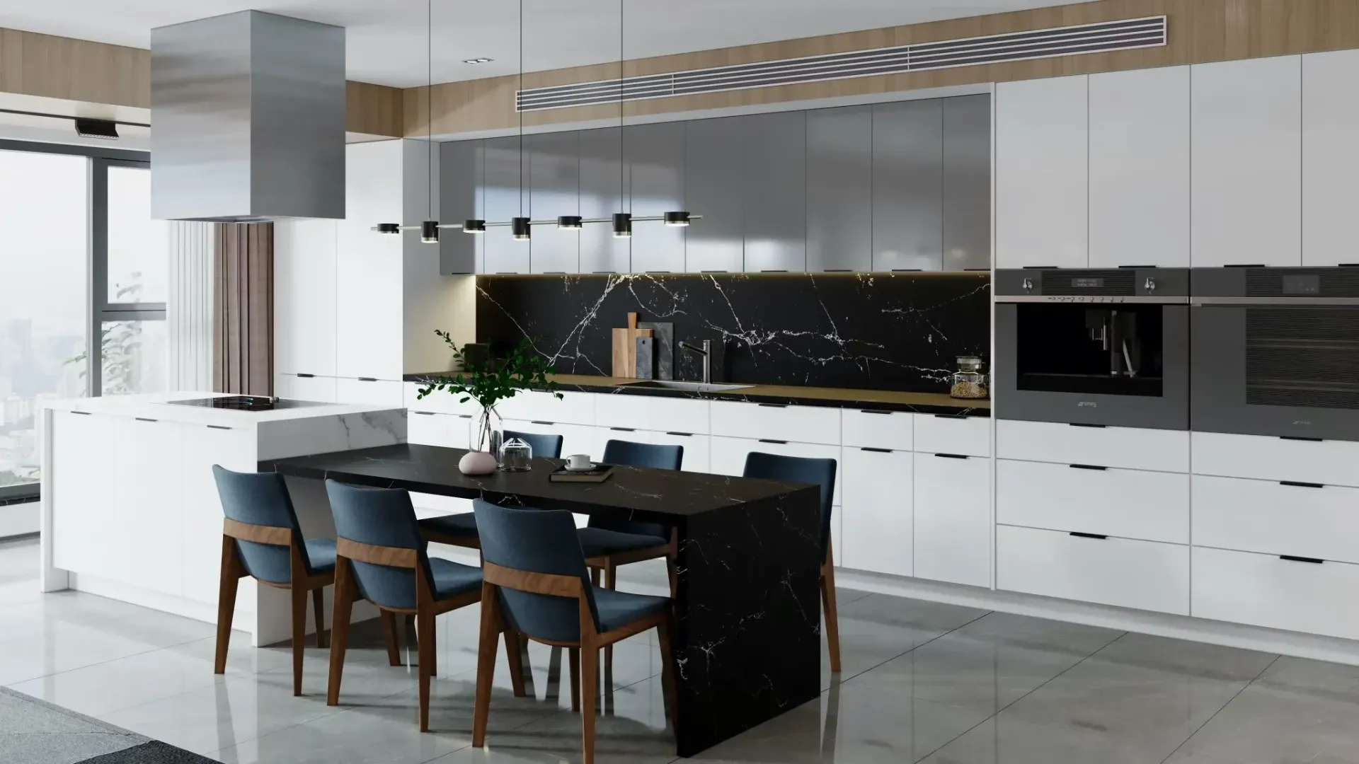 Modern kitchen with black marble countertops, white cabinets, and a dining table with blue chairs.