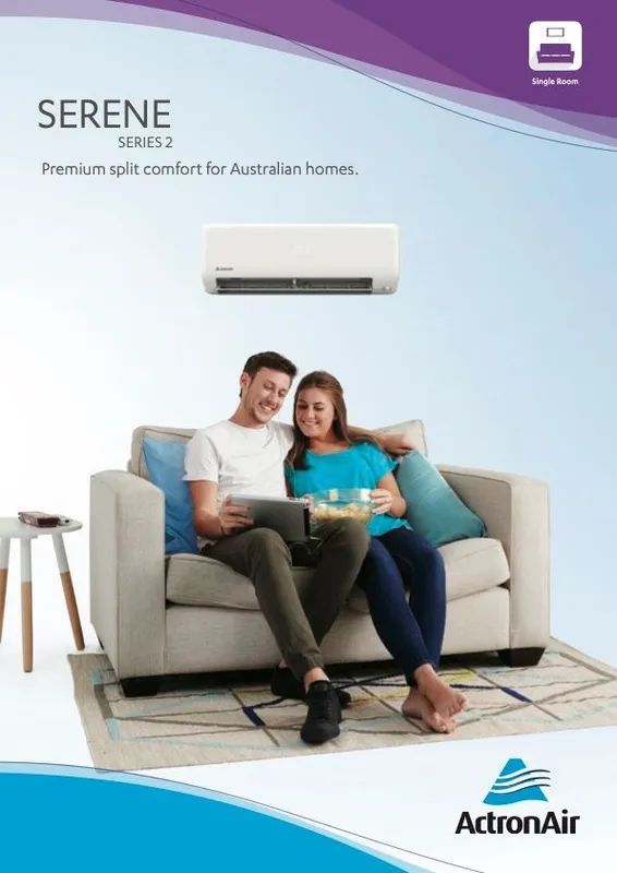 A Man And A Woman Are Sitting On A Couch Looking At A Laptop — Marty Nelson Refrigeration & Air Conditioning In Dubbo, NSW