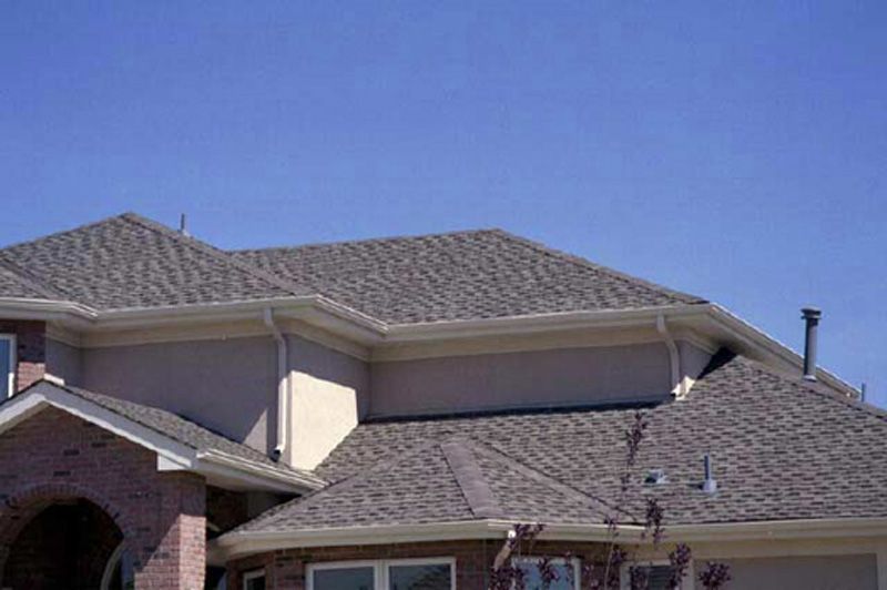 Roof Gutter With Full of Leaves