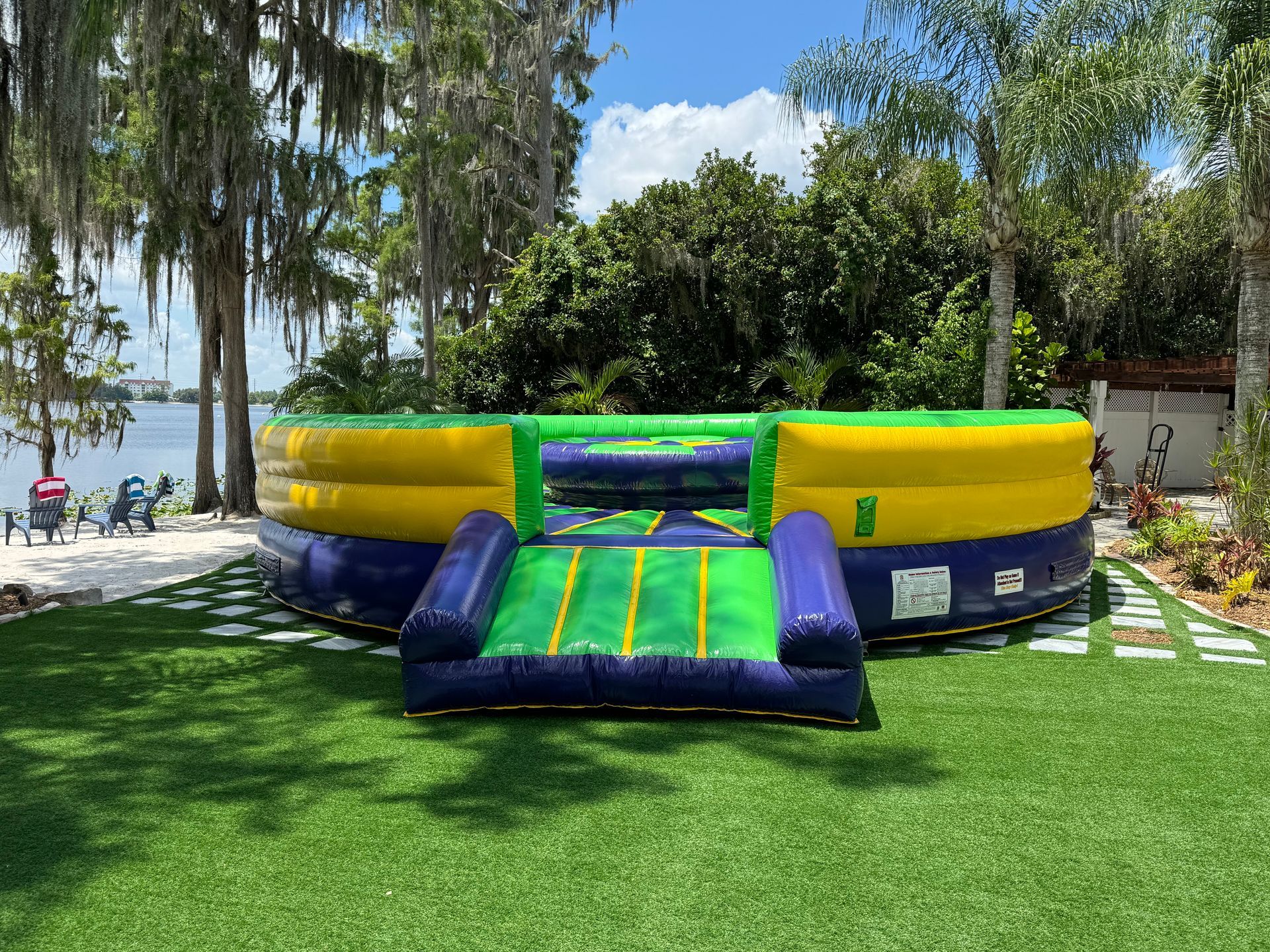 Giant yard pong setup outdoors on a small patch of grass ready for a party