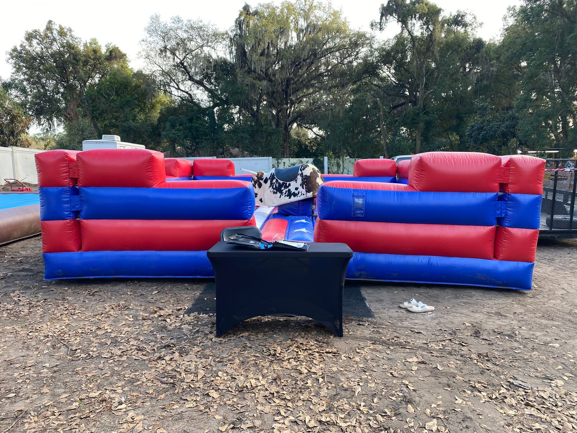 Classic mechanical bull ride with inflatable safety padding.