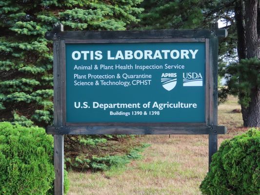 A wooden sign for the 