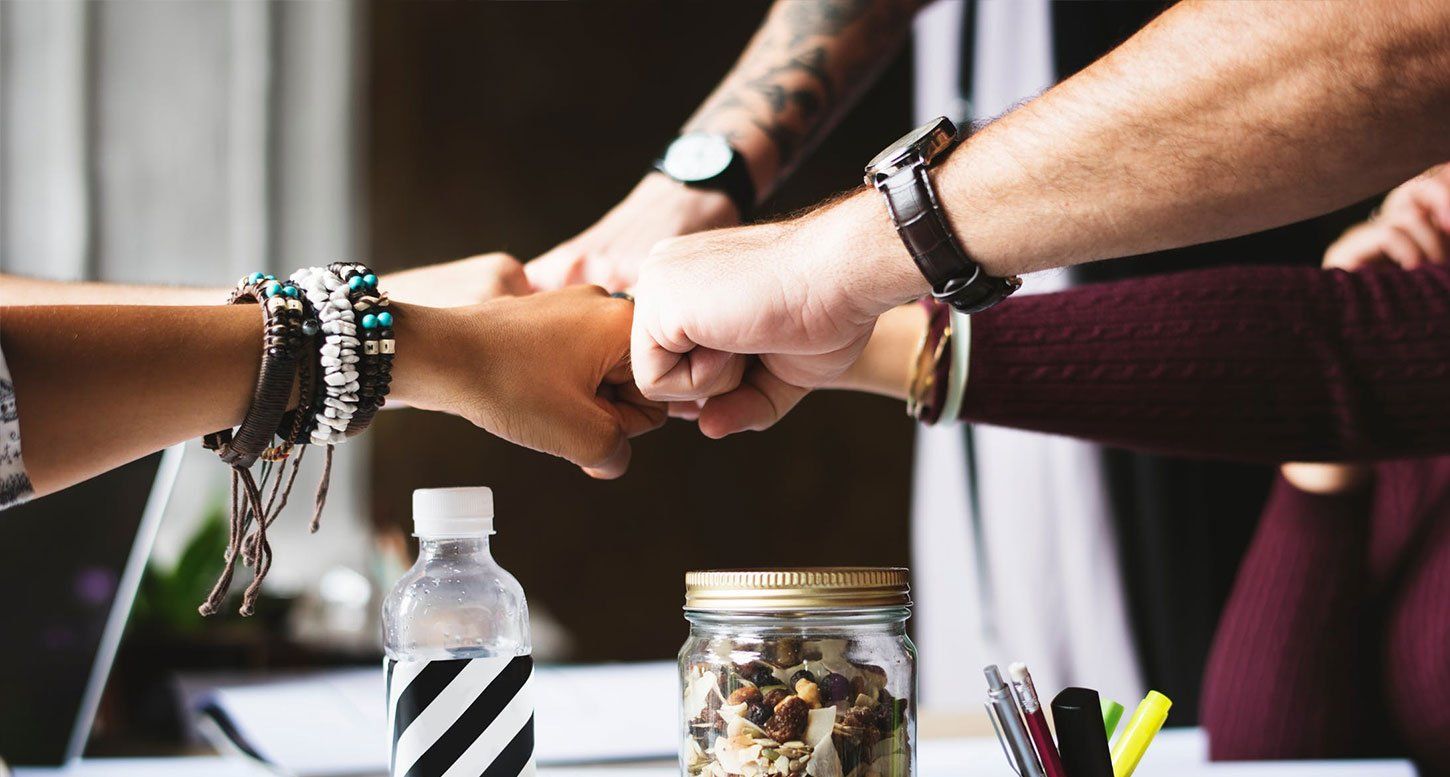 Employee Fist Bumping