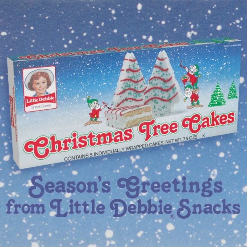 A box of christmas tree cakes says season 's greetings from little debbie snacks