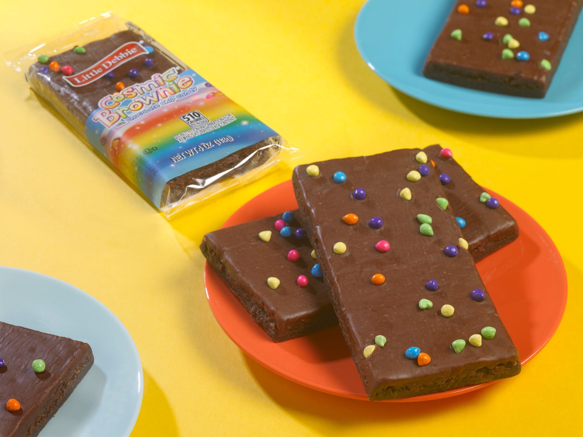 A chocolate brownie with rainbow sprinkles on top