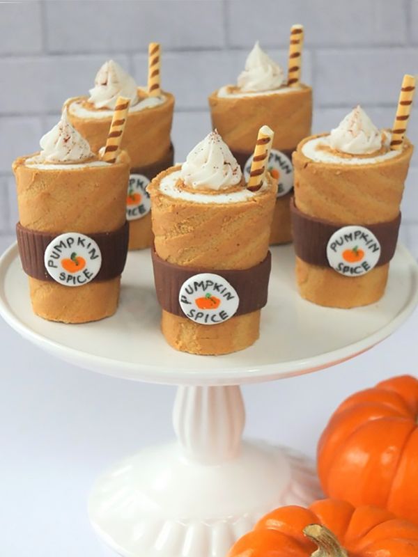 mini pumpkin pies with leaves and pumpkins on top