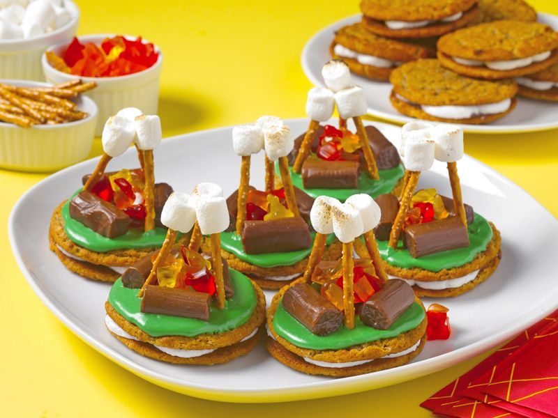 oatmeal creme pie cookies decorated to look like campfires on a white plate