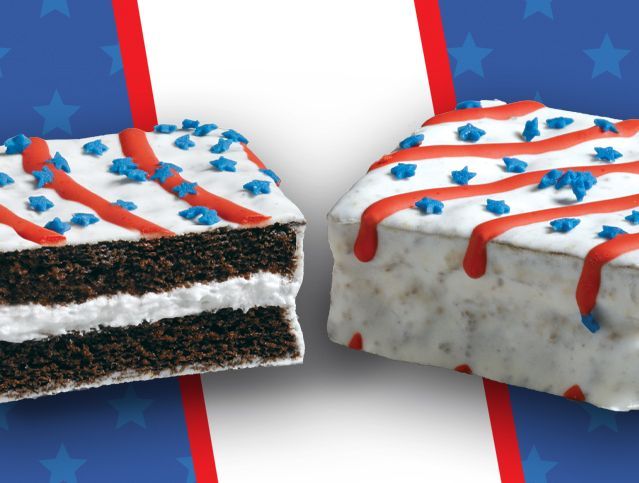 Two pieces of cake with red white and blue sprinkles on them