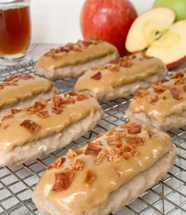 apple cinnamon donut sticks topped with maple glaze and turkey bacon