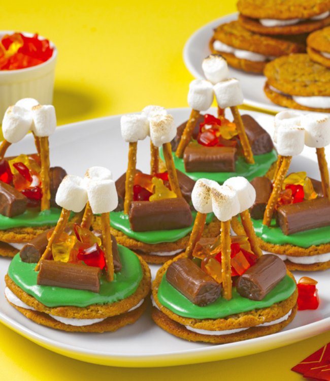 oatmeal creme pies decorated with candies to look like campfires