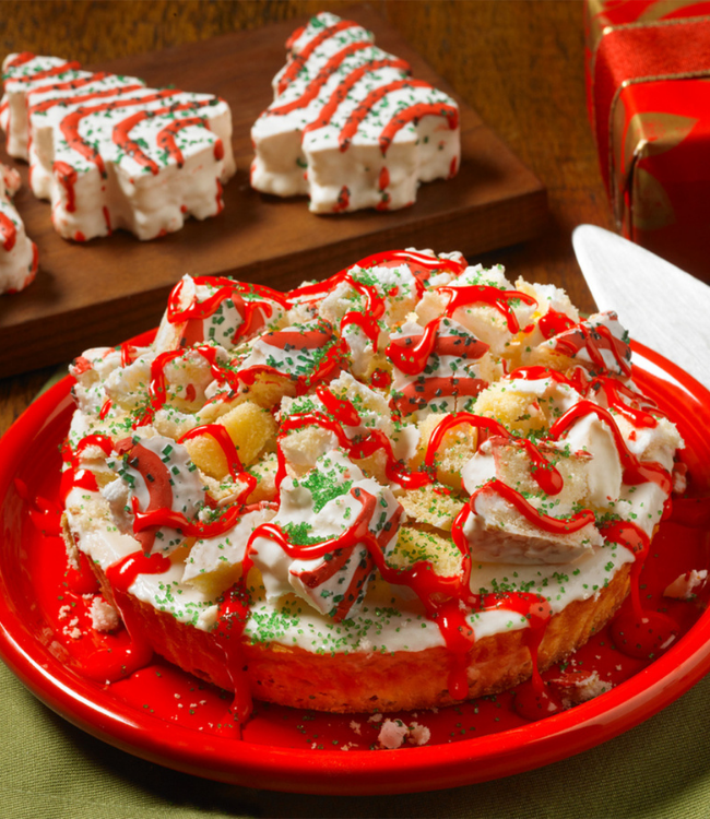 christmas tree cakes cheesecake topped with christmas tree cakes