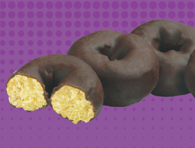 three frosted mini donuts with one missing a bite