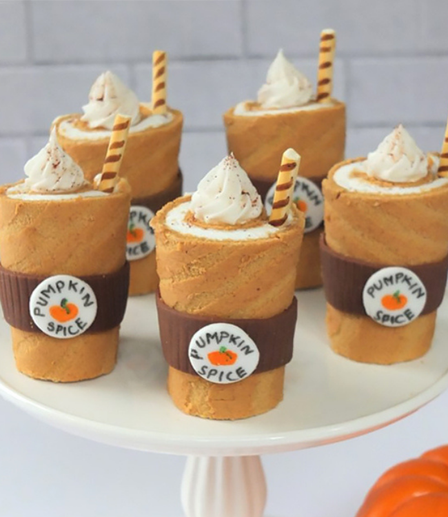 pumpkin spice rolls decorated as pumpkin spice lattes