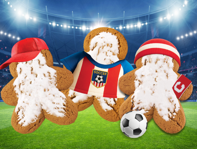 three red, white and blue gingerbread cookies with festive hats and a soccer ball
