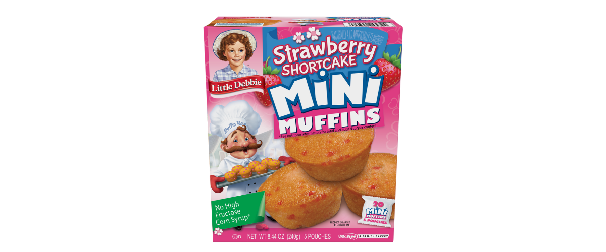 A box of strawberry shortcake mini muffins on a white background.