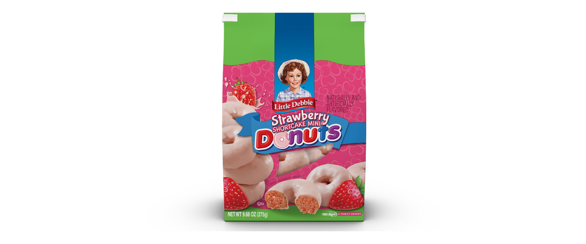 A box of strawberry donuts with a woman on the label.
