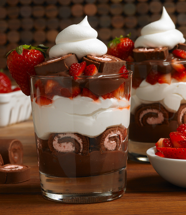 strawberry swiss rolls layered with strawberries, chocolate pudding and whipped topping