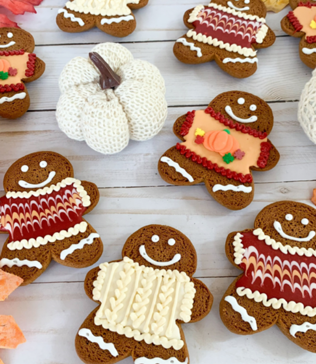 gingebread cookies decorated in sweaters