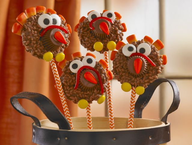 A bunch of turkey cake pops in a basket