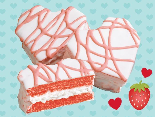 A heart shaped cookie with a bite taken out of it