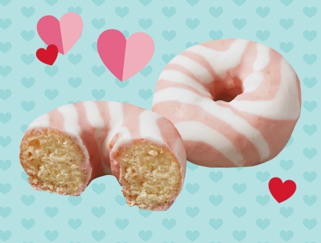 two valentine mini donuts with a bite taken