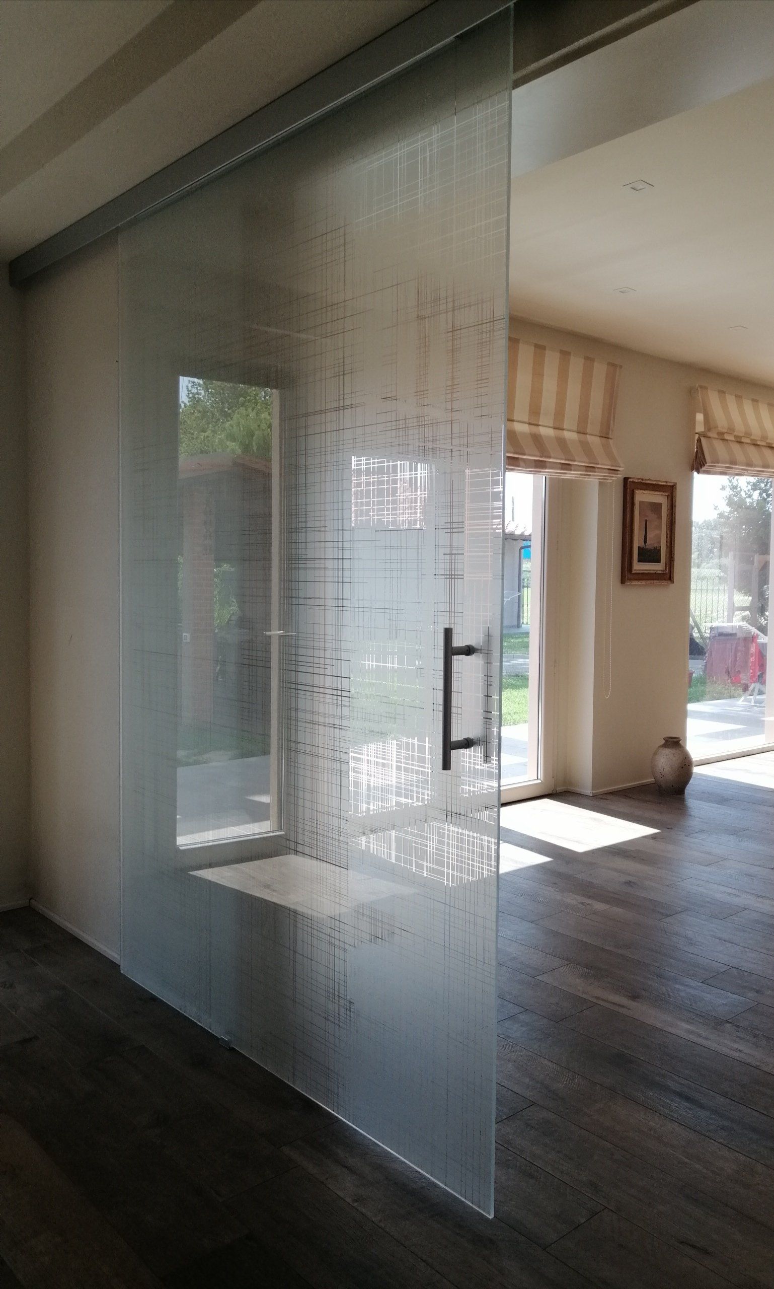 Porte scorrevoli in vetro