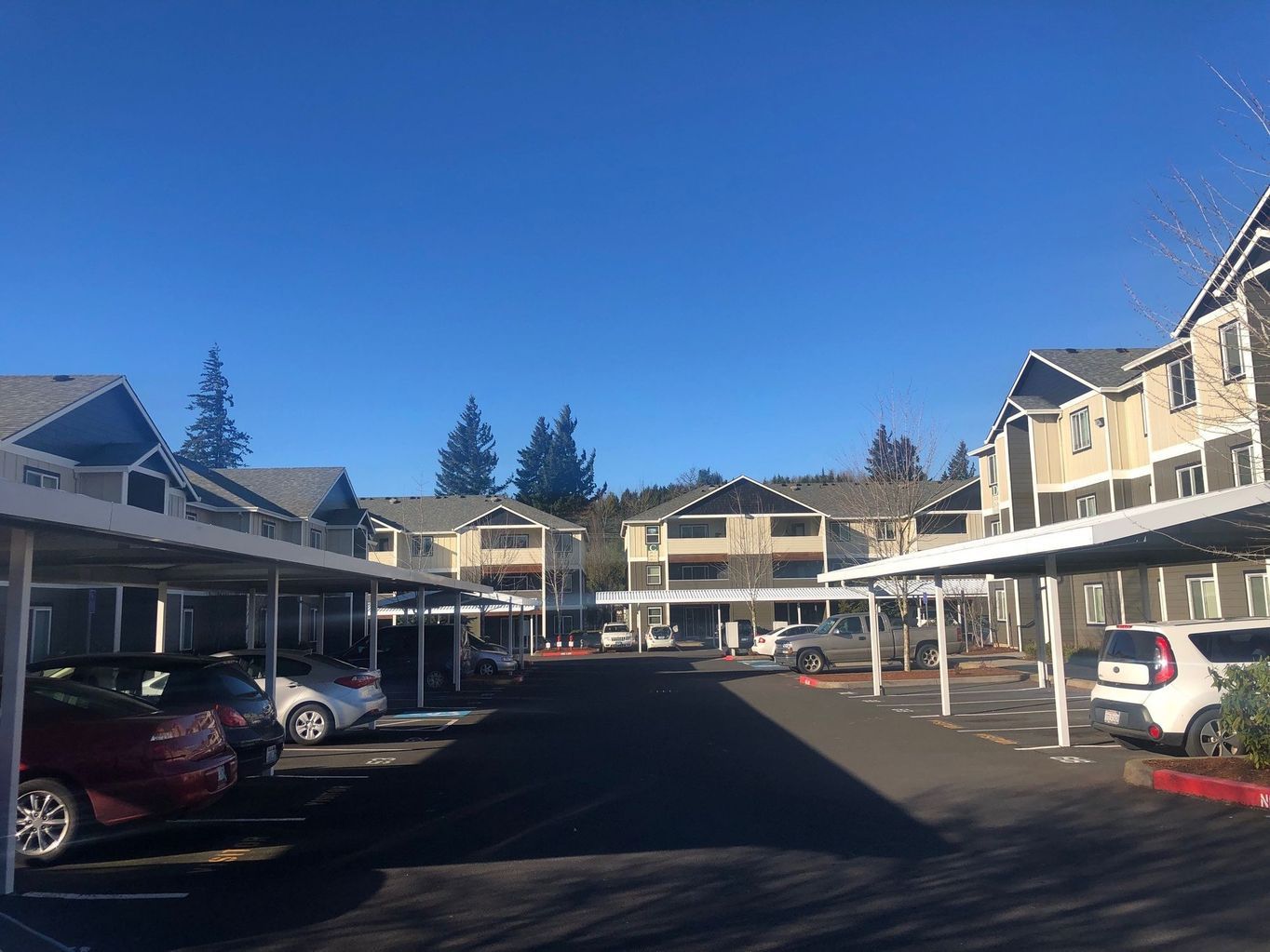 exterior side of building with parked cars
