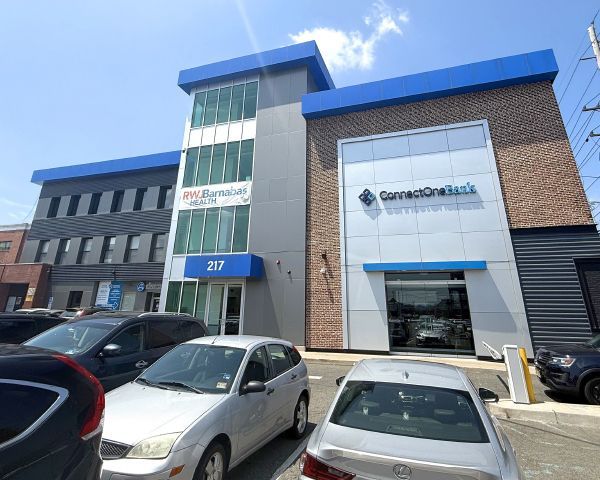 A modern bank building with the name
