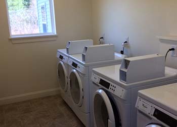 Apartments' Laundry Room - Apartments in Essex Junction, VT