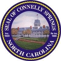 Seal of Connelly Springs, North Carolina, with town hall illustration and blue-gold border