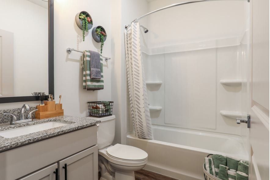 Bathroom with shower and tub