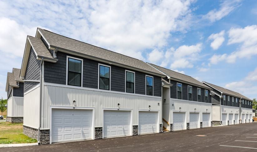 Exterior of Parkview Apartments building with garages